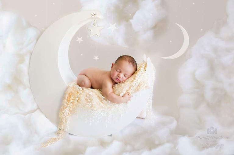 newborn baby on a wooden moon, Baby photographer DC