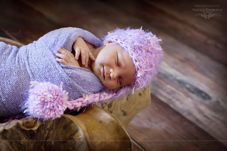 newborn photography wearing pink hat