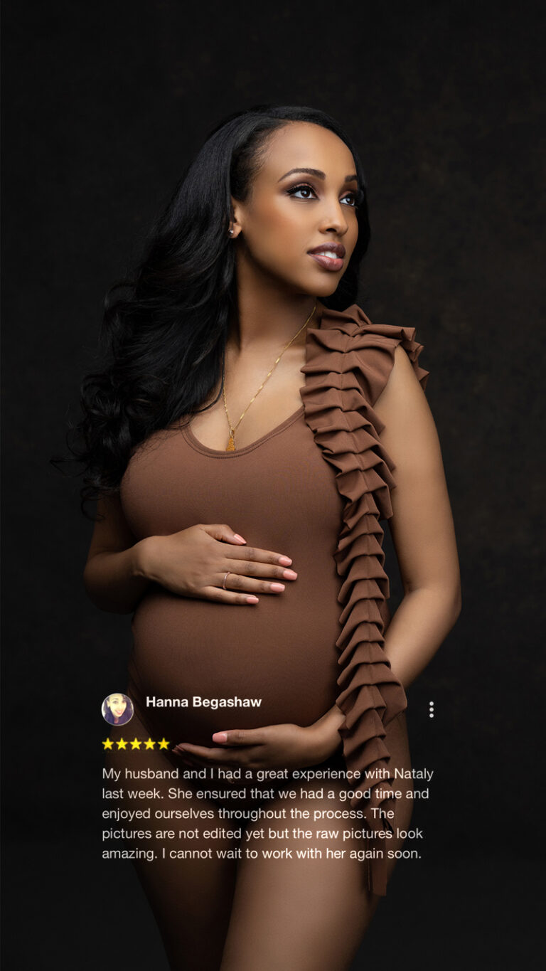 Stylish maternity portrait of Black woman in brown dress on black background with 5-star client review