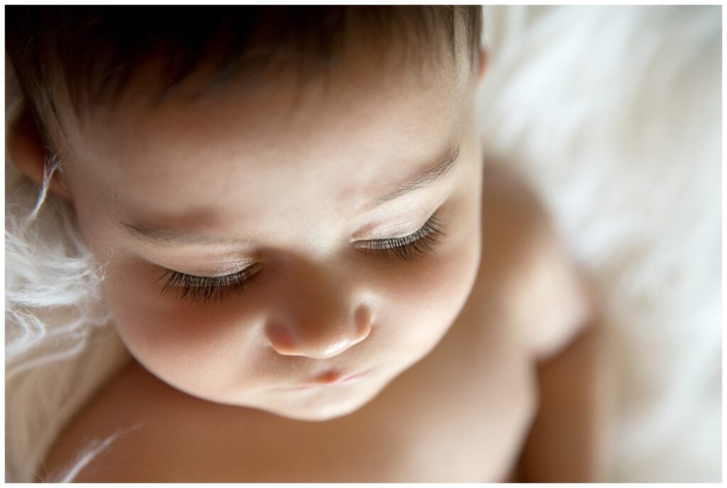 Close-up of baby’s eyelashes by Fairfax newborn photographer